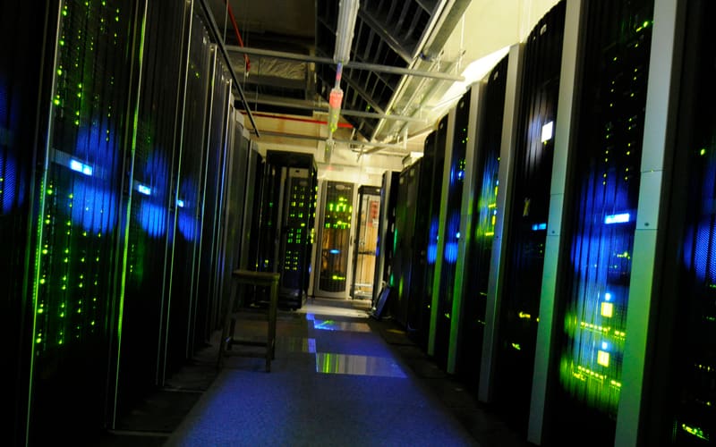 Rows of servers in a data-centre aisle